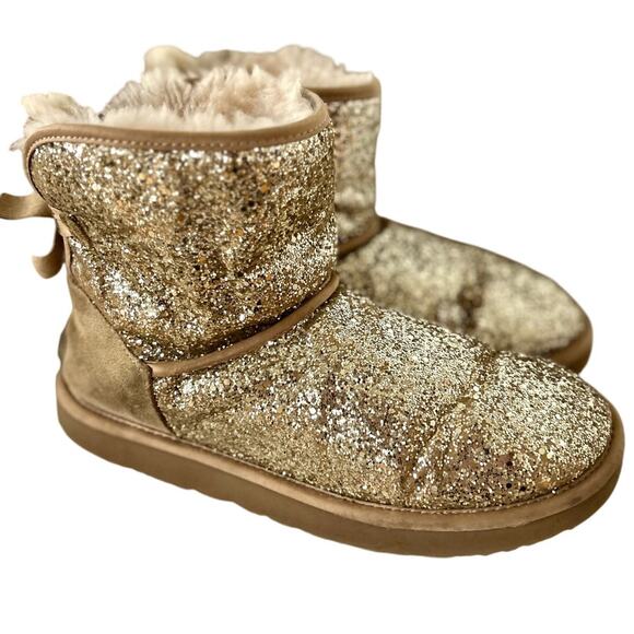 UGG Gold Glitter Sparkle Ankle Shearling Line Bow Back Boot - Picture 1 of 12